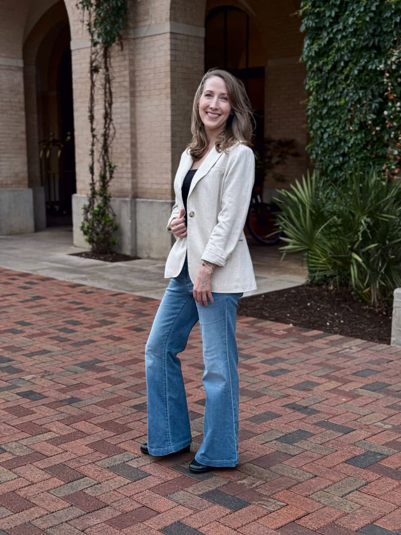 Erin Warner standing outside in a blazer